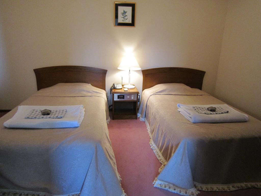 San Hotel Koromogawaso Хираидзуми Номер фото