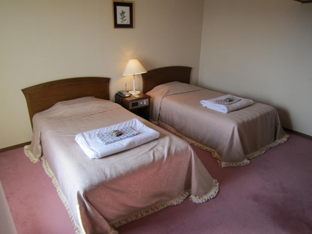 San Hotel Koromogawaso Хираидзуми Номер фото